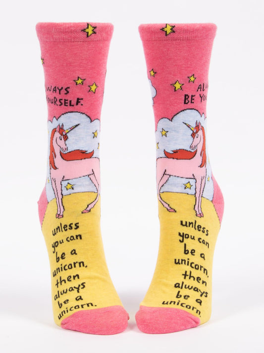 Blue Q Always Be Yourself Unless You Can Be A Unicorn W-Crew Socks feature colorful unicorn, stars, and clouds designs in pink, yellow, blue, and white with the fun phrase: "Always be yourself, unless you can be a unicorn.