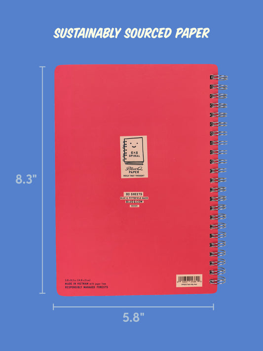 A Blue Q “I Was Put On This Earth To Twirl My Hair And Disagree” spiral notebook, in pink, sits against a blue background. The sustainably sourced paper is highlighted, and dimensions are provided: 8 inches tall by 6 inches wide. Eco-friendly features are noted on the cover—ideal for anyone who wants to twirl their hair, stand out, and make sustainable choices at the same time.
