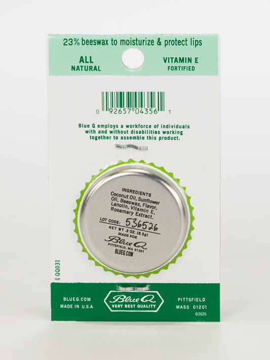Back of a Blue Q Lip Shit Lip Balm-Mojito With Extra Lime package, showing the tin, barcode, all-natural ingredients with 23% beeswax and vitamin E—ideal for bartenders seeking that fresh mojito vibe. Employment and quality info included.