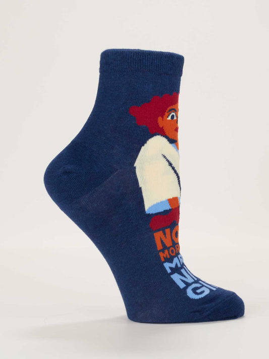 Blue Q's No More Mr. Nice Girl W-Ankle Socks feature combed cotton in blue, a cartoon figure in a white coat and red pants, plus "NO MORE MR. NICE GUY" text. Fits women's shoe size 5-10.