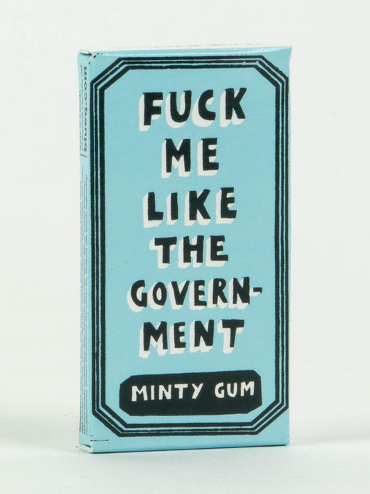 A blue box of Blue Q's “Fuck Me Like The Government Gum” features bold black and white text. This candy-coated gum packs a powerful peppermint punch in every bite.