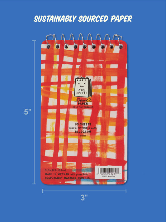 The Blue Q "Preparing For A Busy Day Of Fighting My Mind" 3x5 spiral notebook features a red and yellow abstract cover on blue, labeled as sustainably sourced paper, with its 3" x 5" size noted beside it.